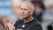 Sep 7, 2024; Charlotte, North Carolina, USA; North Carolina State Wolfpack head coach Dave Doeren during pregame activities against the Tennessee Volunteers at the Dukes Mayo Classic at Bank of America Stadium. Mandatory Credit: Jim Dedmon-Imagn Images