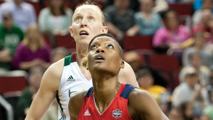 June 24, 2012; Seattle, WA, USA; Washington Mystics center Ashley Robinson (43) blocks out Seattle Storm center Ann Wauters (12) during a free throw in the first half at KeyArena. Mandatory Credit: Steven Bisig-Imagn Images