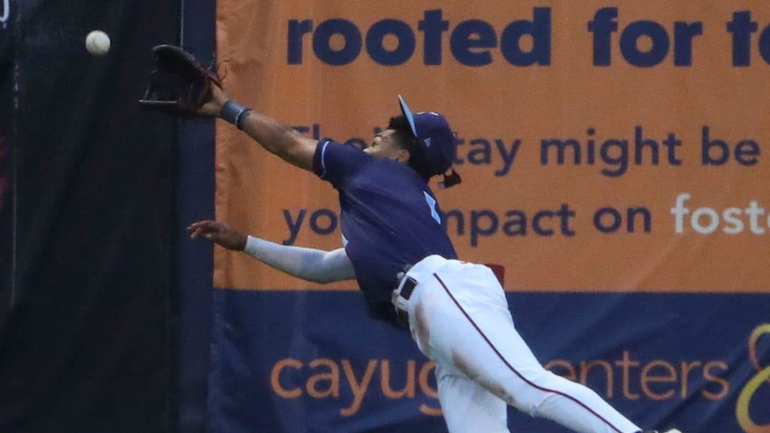 Wilmington's Daylen Lile dives but can't get to a long Renegade drive in the fourth inning of the Blue Rocks' 6-3 loss at Frawley Stadium, Friday, August 4, 2023.