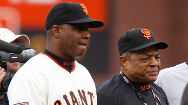 July 10, 2007; San Francisco, CA, USA; 2007 Major League Baseball All-Star Game  -- Barry Bonds walks Willie Mays to a 1958 Cadillac during a pre-game tribute to Mays. 