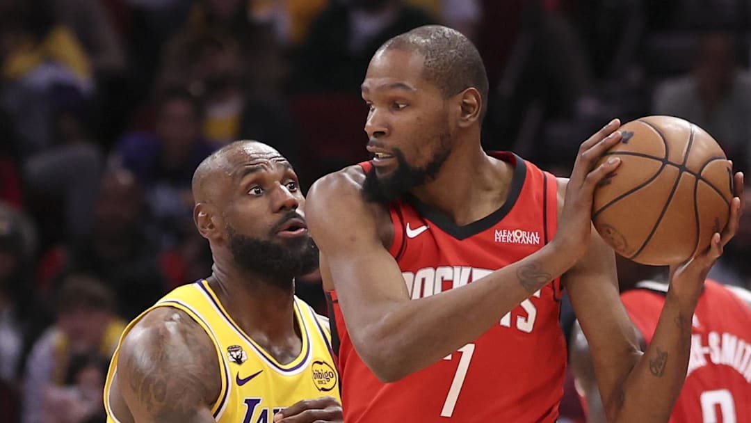 Mar 16, 2026; Houston, Texas, USA; Los Angeles Lakers forward LeBron James (23) defends against Houston Rockets forward Kevin Durant (7) during the fourth quarter at Toyota Center. Mandatory Credit: Troy Taormina-Imagn Images