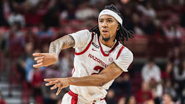 Boogie Fland (2) passes the ball against the North Carolina A&T Aggies. The Razorbacks won 95-67. 