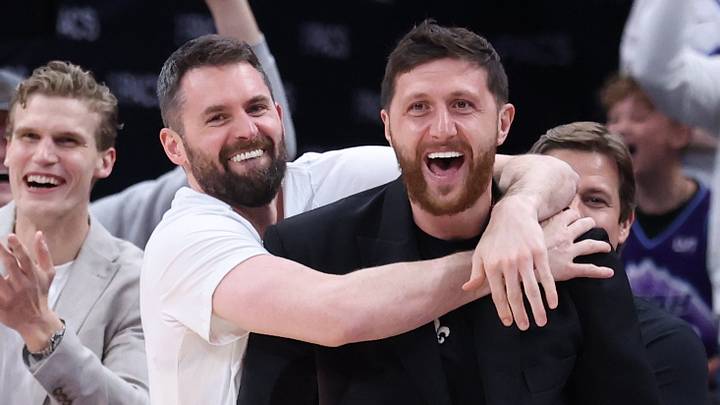 Apr 10, 2026; Salt Lake City, Utah, USA; Utah Jazz forward Lauri Markkanen, forward Kevin Love (middle) and center Jusuf Nurkic react after guard John Konchar completes a triple double against the Memphis Grizzlies during the second half at Delta Center. Mandatory Credit: Rob Gray-Imagn Images