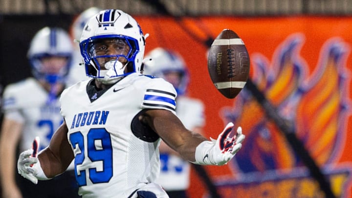 Auburn's Omar Mabson (29) reaches for a pass at Cramton Bowl in Montgomery, Ala., on Friday, Oct. 18, 2024, as his team rolled over Carver. Auburn's Omar Mabson (29) reaches for a pass at Cramton Bowl in Montgomery, Ala., on Friday, Oct. 18, 2024, as his team rolled over Carver.