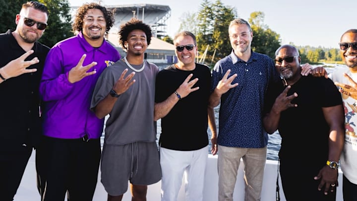 Mason James posed with Jedd Fisch and the UW offensive staff. Mason James posed with Jedd Fisch and the UW offensive staff.