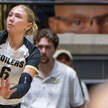 Purdue Redshirt Freshman Sienna Foster (6) serves during an NCAA volleyball match