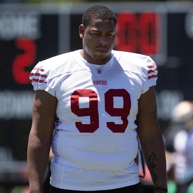 San Francisco 49ers second-round draft pick Alfred Collins (99) watches his teammates work out during the teamís rookie minic