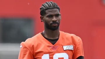 Jun 10, 2025; Berea, OH, USA; Cleveland Browns quarterback Shedeur Sanders (12) and managing and principal partner Jimmy Haslam watch a play during minicamp at CrossCountry Mortgage Campus. Mandatory Credit: Ken Blaze-Imagn Images
