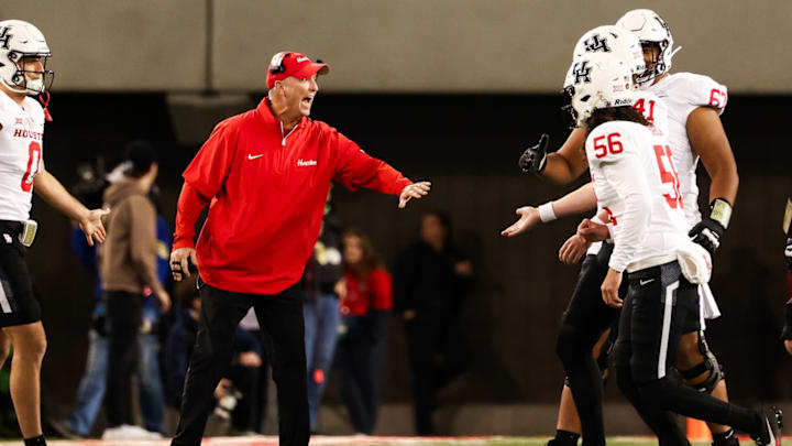 Houston coach Willie Fritz (left) Houston coach Willie Fritz (left)