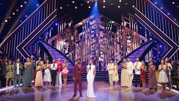 The remaining couples on Dancing With the Stars stand on stage awaiting their results