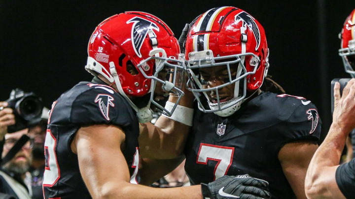 Bijan Robinson, right, and the Falcons showed they had a method to their draft madness over the rest of the offseason.