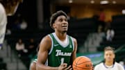 Tulane forward Kaleb Banks (1) settles down for a foul shot against New Orleans during the second half of a men's NCAA basketball game at Devlin Fieldhouse in New Orleans, Friday, Nov. 22, 2024.