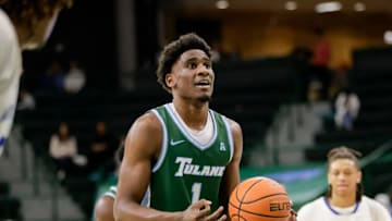 Tulane forward Kaleb Banks (1) settles down for a foul shot against New Orleans during the second half of a men's NCAA basketball game at Devlin Fieldhouse in New Orleans, Friday, Nov. 22, 2024.