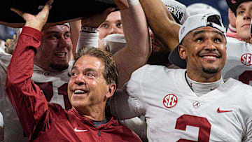 Alabama head coach Nick Saban and Alabama quarterback Jalen Hurts (2) lift the SEC Trophy after defeating Georgia  in the SEC Championship Game at Mercedes Benz Stadium in Atlanta, Ga., on Saturday December 1, 2018. 

Sec16