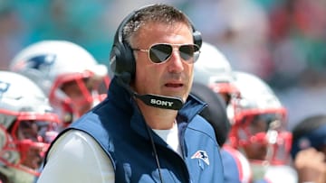 Sep 14, 2025; Miami Gardens, Florida, USA; New England Patriots head coach Mike Vrabel watches from the sideline against the Miami Dolphins during the first quarter at Hard Rock Stadium. Mandatory Credit: Sam Navarro-Imagn Images