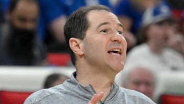 Mar 21, 2025; Raleigh, NC, USA; Baylor Bears head coach Scott Drew reacts during the second half against the Mississippi State Bulldogs in the first round of the NCAA Tournament at Lenovo Center. Mandatory Credit: Zachary Taft-Imagn Images