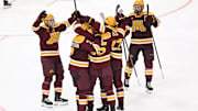 The Gophers celebrate against North Dakota on Saturday night in Grand Forks. 