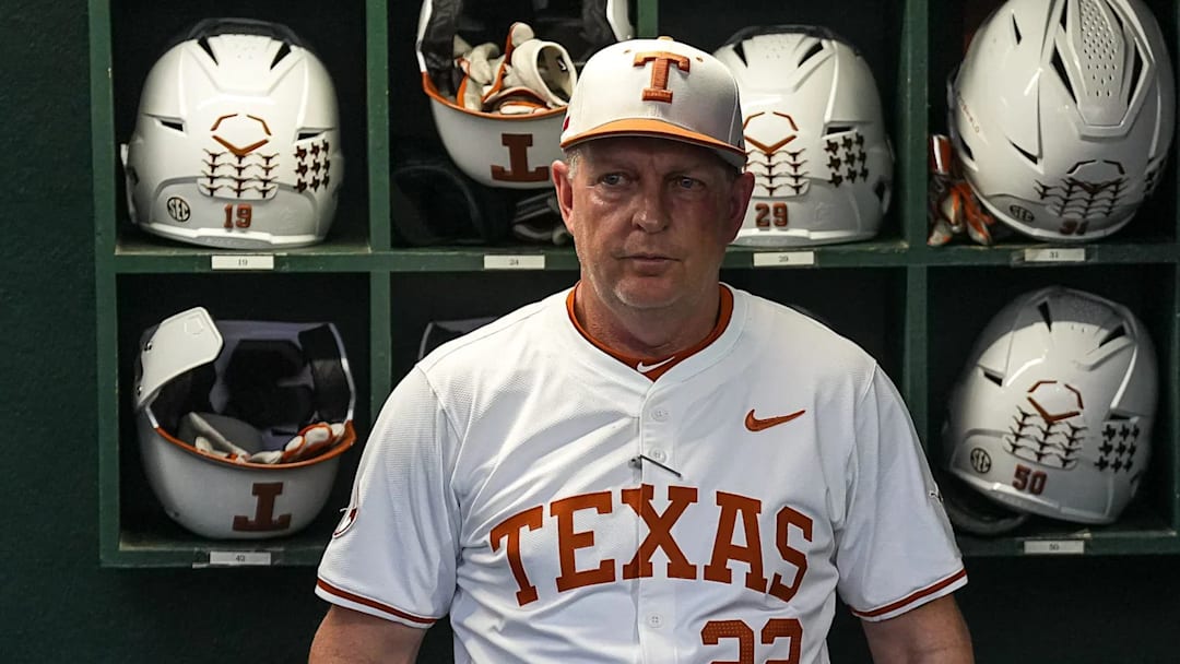Texas Longhorns head coach Jim Schlossnagle stands in the dugout ahead of the Lone Star Showdown.