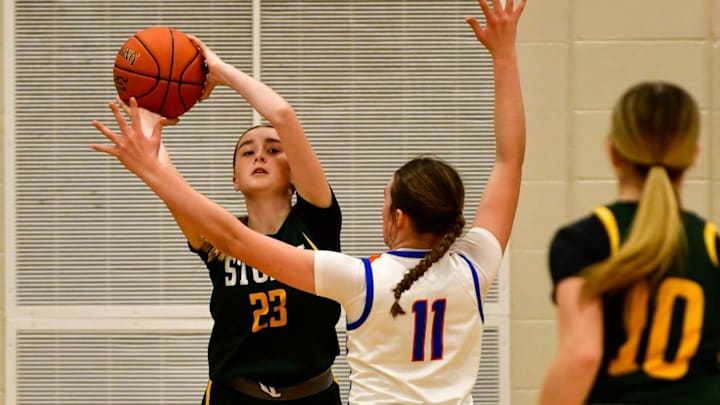 Sauk Rapids girls basketball sophomore Brooklyn Widmer inbounds the ball during a game against the St. Cloud Crush on Dec. 6, 2024 at Sauk Rapids High School. The Storm lost 70-51. Sauk Rapids girls basketball sophomore Brooklyn Widmer inbounds the ball during a game against the St. Cloud Crush on Dec. 6, 2024 at Sauk Rapids High School. The Storm lost 70-51.