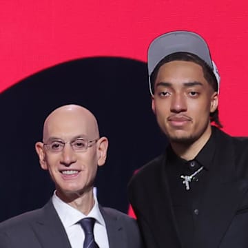 Jun 25, 2025; Brooklyn, NY, USA;  Noa Essengue stands with NBA commissioner Adam Silver after being selected as the 12th pick by the Chicago Bulls in the first round of the 2025 NBA Draft at Barclays Center. Mandatory Credit: Brad Penner-Imagn Images