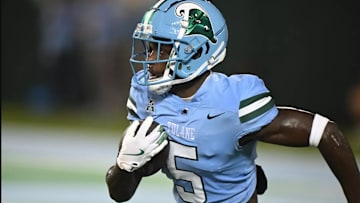 Tulane Green Wave cornerback Rayshawn Pleasant returning a 100-yard interception for a touchdown vs. Southeastern Louisiana.