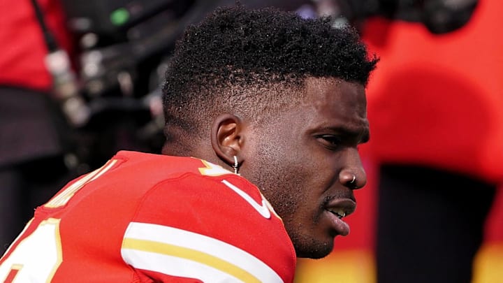 Jan 30, 2022; Kansas City, Missouri, USA; Kansas City Chiefs wide receiver Tyreek Hill (10) watches warm ups before the AFC Championship Game against the Cincinnati Bengals at GEHA Field at Arrowhead Stadium. Mandatory Credit: Denny Medley-Imagn Images