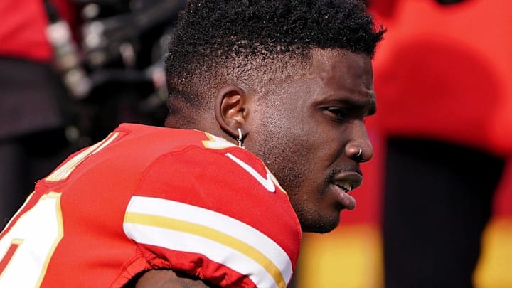 Former Kansas City Chiefs wide receiver Tyreek Hill (10) watches warm-ups before the AFC Championship Game against the Cincinnati Bengals at GEHA Field at Arrowhead Stadium.