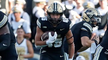 Purdue Boilermakers running back Devin Mockobee (45) runs with the ball 