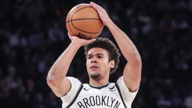 Mar 23, 2024; New York, New York, USA;  Brooklyn Nets forward Cameron Johnson (2) takes a three point shot