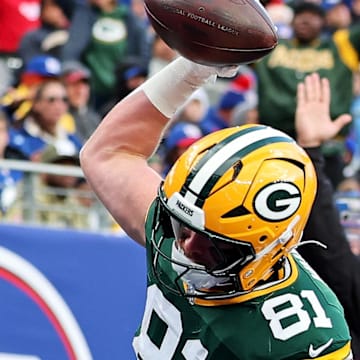 Green Bay Packers tight end Josh Whyle (81) celebrates after catching a touchdown pass against the Giants.