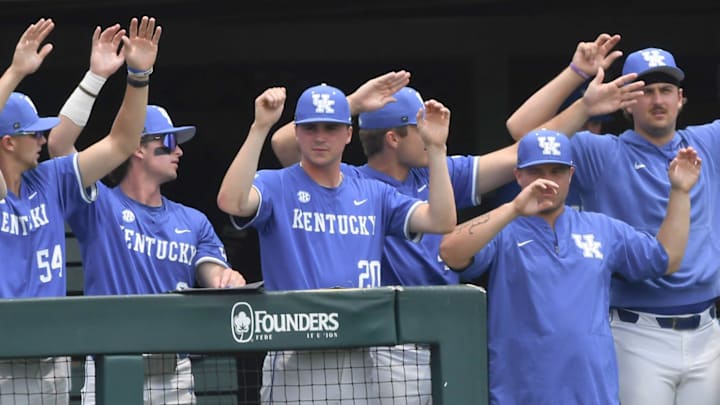 University of Kentucky players wave between innings playing Clemson during the bottom of the fourth inning at the NCAA baseball Clemson Regional at Doug Kingsmore Stadium in Clemson, S.C. Sunday, June 1, 2025.