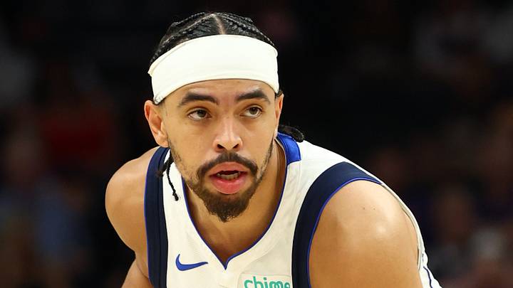 Apr 8, 2026; Phoenix, Arizona, USA; Dallas Mavericks guard Ryan Nembhard (9) against the Phoenix Suns at Mortgage Matchup Center. Mandatory Credit: Mark J. Rebilas-Imagn Images