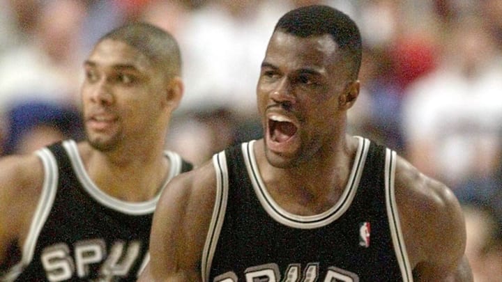 David Robinson (R) celebrates a basket with Tim Du