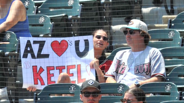 Fans hold up a sign in support of Arizona Diamondbacks second baseman Ketel Marte (not pictured) during the first inning game against the Chicago White Sox on Wednesday at Rate Field.