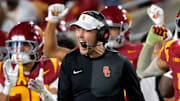 Oct 11, 2025; Los Angeles, California, USA;  USC Trojans head coach Lincoln Riley celebrates after kicker Ryon Sayeri (48) hit a 54-yard field goal in the second half against the Michigan Wolverines at United Airlines Field at the Los Angeles Memorial Coliseum. Mandatory Credit: Jayne Kamin-Oncea-Imagn Images