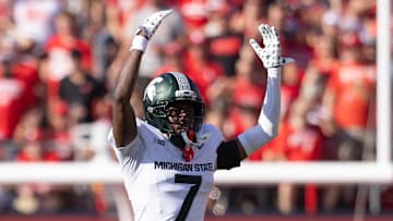 Oct 4, 2025; Lincoln, Nebraska, USA; Michigan State Spartans defensive back Joshua Eaton (7) celebrates after the Michigan defense forces a stop during the game against the Nebraska Cornhuskers at Memorial Stadium. Mandatory Credit: Kylie Graham-Imagn Images