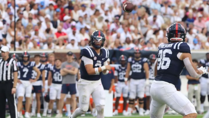 Ole Miss quarterback Jaxson Dart passes to Caden Prieskorn in the first half of Saturday's game against Furman.