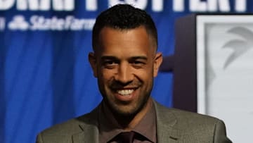 Atlanta Hawks general manager Landry Fields poses for pictures at the 2024 draft lottery.