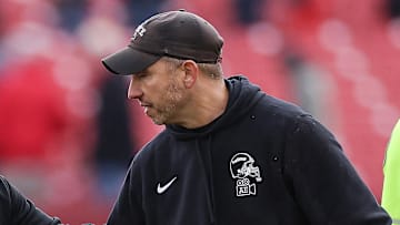 Nov 1, 2025; Ames, Iowa, USA; Arizona State Sun Devils head coach Kenny Dillingham and Iowa State Cyclones head coach Matt Campbell shake hands after the game at Jack Trice Stadium. 