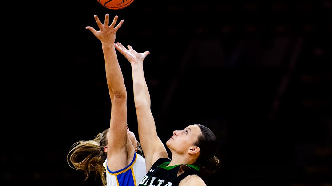Timnath's Olivia Zadeh gets the tip off during a Final Four game against Delta on Friday, March 14, 2025 at the Denver Coliseum in Denver, Colo.
