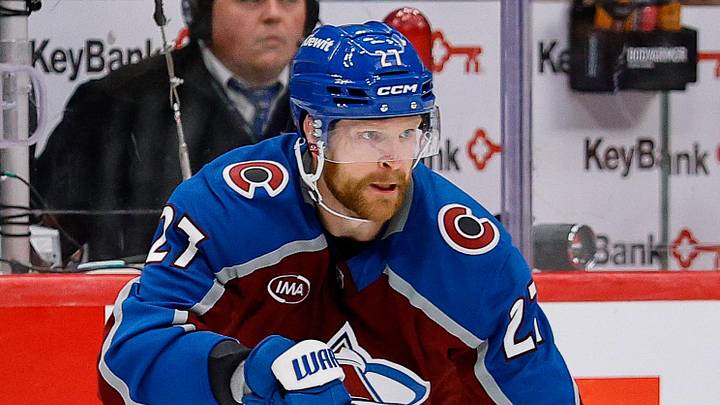 May 13, 2026; Denver, Colorado, USA; Colorado Avalanche defenseman Brett Kulak (27) controls the puck in overtime against the Minnesota Wild in game five of the second round of the 2026 Stanely Cup Playoffs at Ball Arena. Mandatory Credit: Isaiah J. Downing-Imagn Images