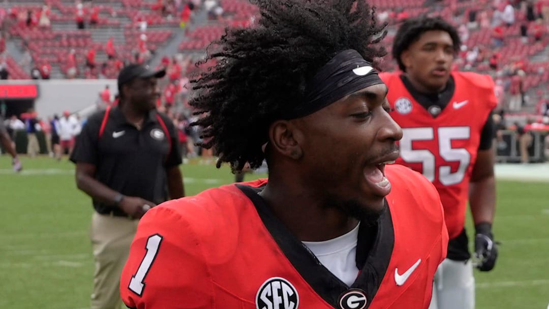 Georgia wide receiver Zachariah Branch (1) and Georgia running back Josh McCray (2) after getting a win in a NCAA college football game against Kentucky in Athens, Ga., on Saturday, October 4, 2025. Georgia won 35-14.