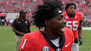 Georgia wide receiver Zachariah Branch (1) and Georgia running back Josh McCray (2) after getting a win in a NCAA college football game against Kentucky in Athens, Ga., on Saturday, October 4, 2025. Georgia won 35-14.