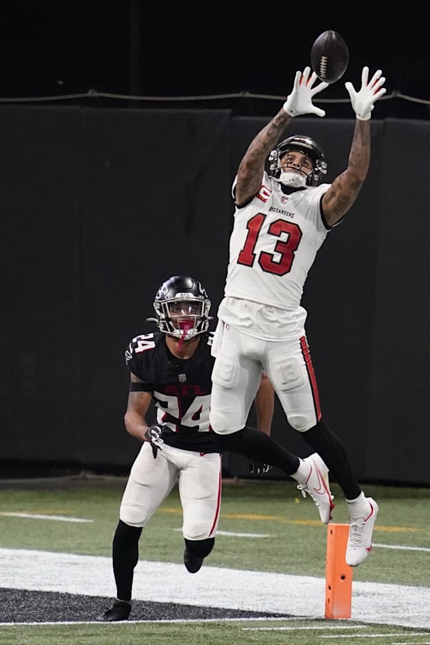 Tampa Bay Buccaneers wide receiver Mike Evans catches a pass against Atlanta Falcons cornerback A.J. Terrell