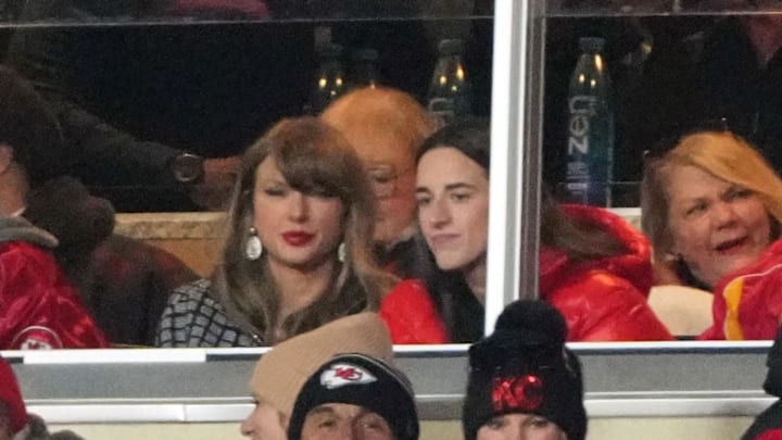 Taylor Swift sits with Indiana Fever guard Caitlin Clark during the 2025 AFC divisional game between the Kansas City Chiefs and Houston Texans 