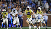 Oct 28, 2023; Atlanta, Georgia, USA; Georgia Tech Yellow Jackets quarterback Haynes King (10) runs the ball against the North Carolina Tar Heels in the second half at Bobby Dodd Stadium at Hyundai Field. Mandatory Credit: Brett Davis-Imagn Images