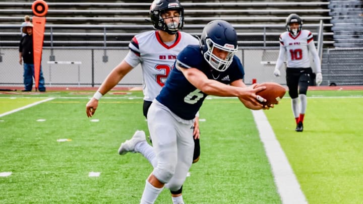Liberty Christian's Joey Isley scores a touchdown in the Patriots' win over Neah Bay in Everett. Liberty Christian's Joey Isley scores a touchdown in the Patriots' win over Neah Bay in Everett.