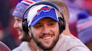 Buffalo Bills quarterback Josh Allen smiles toward the sidelines against the Kansas City Chiefs.