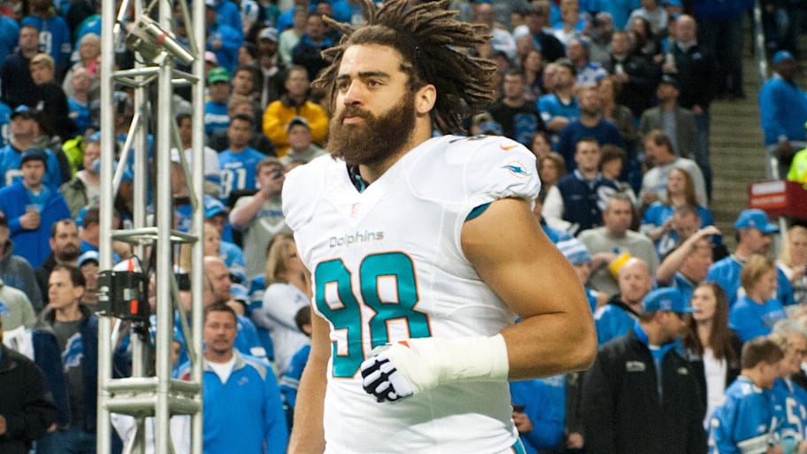 Miami Dolphins defensive tackle Jared Odrick (98) takes the field before the game against the Detroit Lions at Ford Field in 2014. | Tim Fuller-USA TODAY Sports