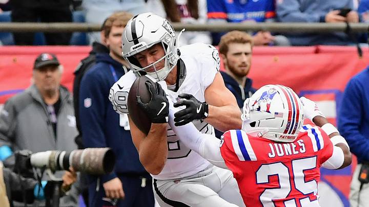 Las Vegas Raiders tight end Brock Bowers catches a touchdown pass over Patriots cornerback Marcus Jones.
